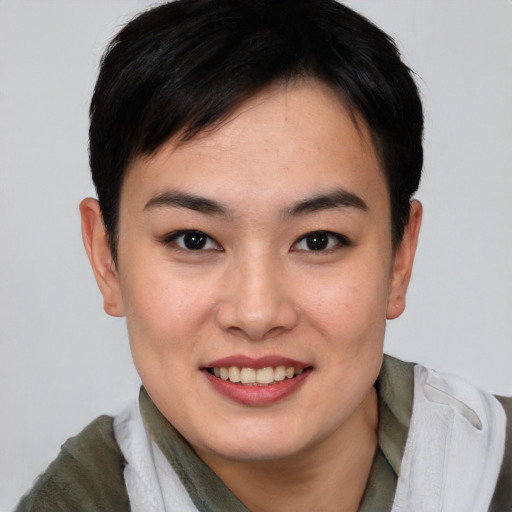 Joyful white young-adult female with short  brown hair and brown eyes