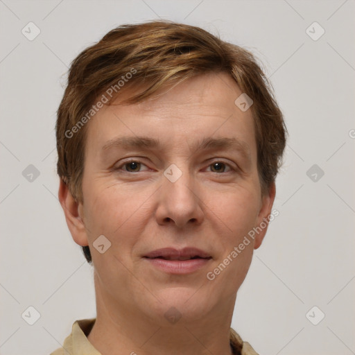 Joyful white adult male with short  brown hair and grey eyes