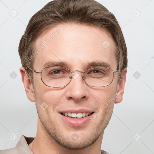 Joyful white adult male with short  brown hair and grey eyes