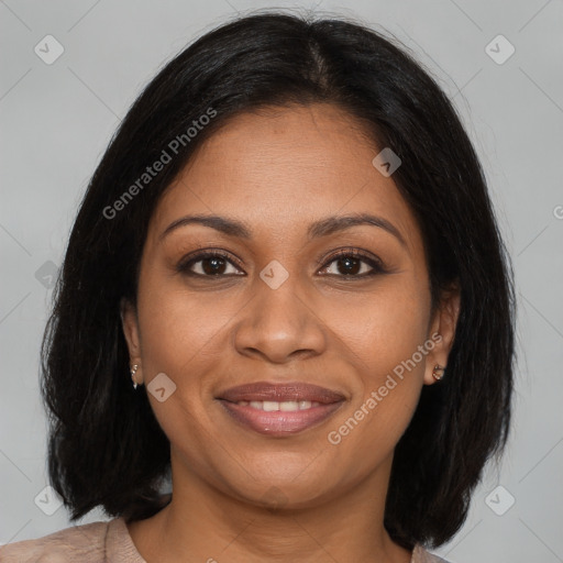 Joyful black young-adult female with medium  brown hair and brown eyes