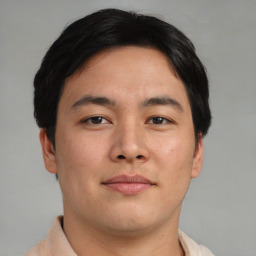 Neutral asian young-adult male with short  brown hair and brown eyes