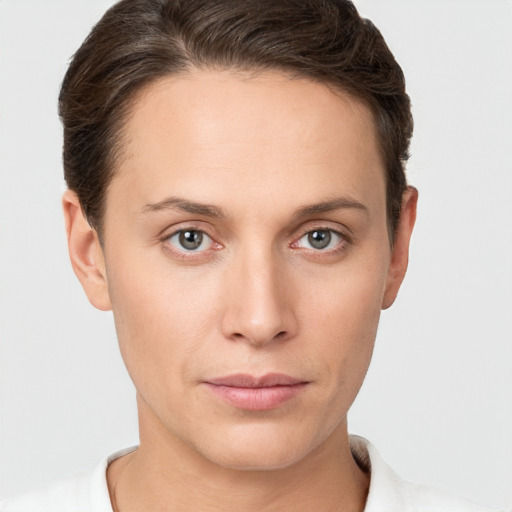 Neutral white young-adult female with short  brown hair and brown eyes