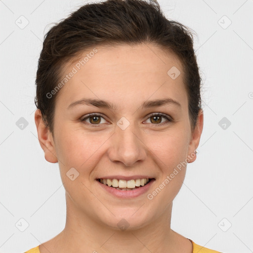 Joyful white young-adult female with short  brown hair and brown eyes