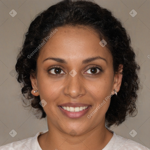 Joyful black young-adult female with medium  brown hair and brown eyes