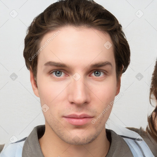 Neutral white young-adult male with short  brown hair and grey eyes