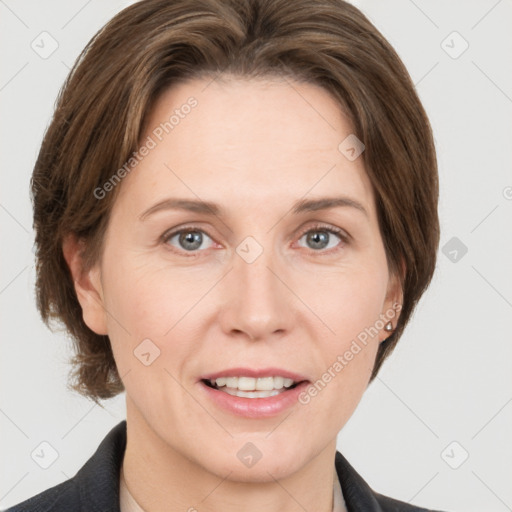 Joyful white adult female with medium  brown hair and grey eyes