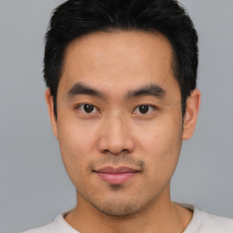 Neutral asian young-adult male with short  black hair and brown eyes