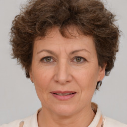 Joyful white adult female with short  brown hair and brown eyes