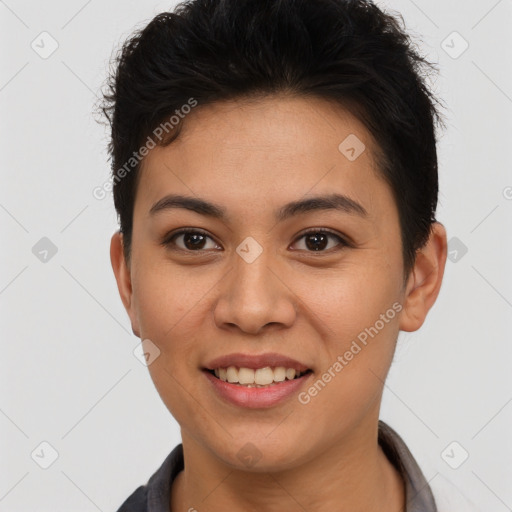 Joyful asian young-adult female with short  brown hair and brown eyes