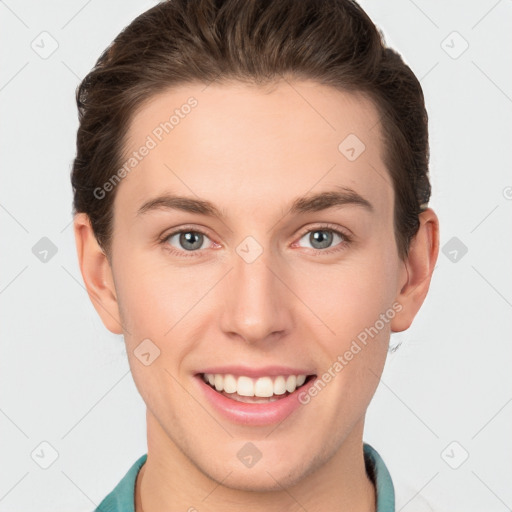 Joyful white young-adult female with short  brown hair and grey eyes