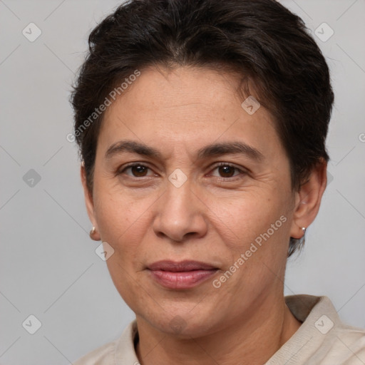 Joyful white adult female with short  brown hair and brown eyes