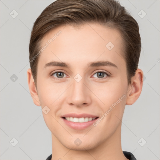 Joyful white young-adult female with short  brown hair and grey eyes