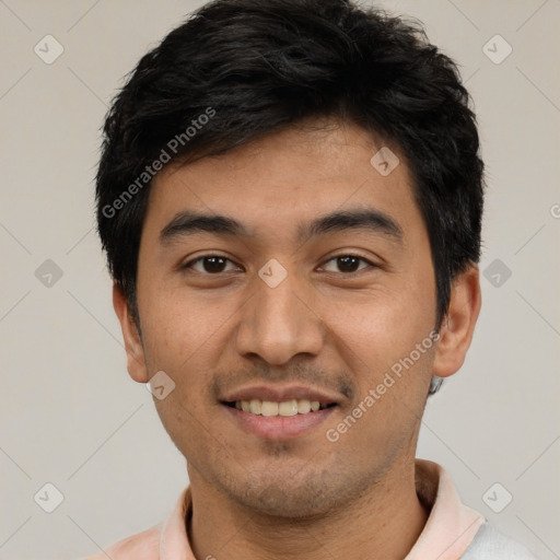 Joyful latino young-adult male with short  black hair and brown eyes