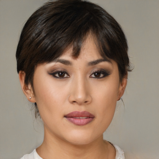 Neutral white young-adult female with medium  brown hair and brown eyes