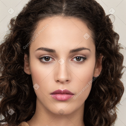 Neutral white young-adult female with long  brown hair and brown eyes