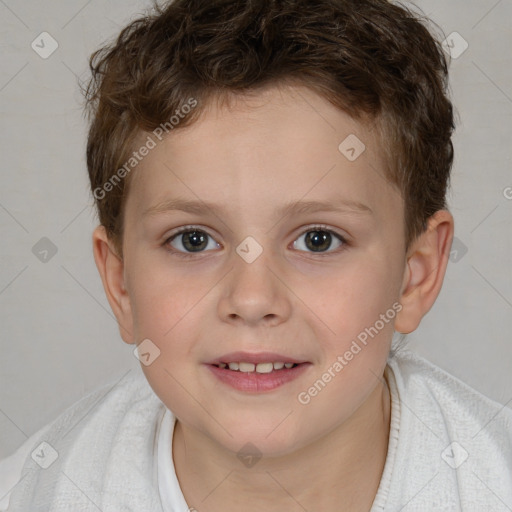 Joyful white child male with short  brown hair and brown eyes