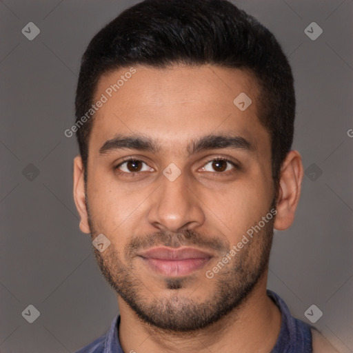 Joyful latino young-adult male with short  brown hair and brown eyes