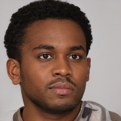 Neutral black young-adult male with short  brown hair and brown eyes