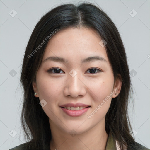 Joyful asian young-adult female with long  brown hair and brown eyes