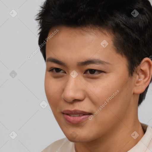 Joyful asian young-adult male with short  brown hair and brown eyes