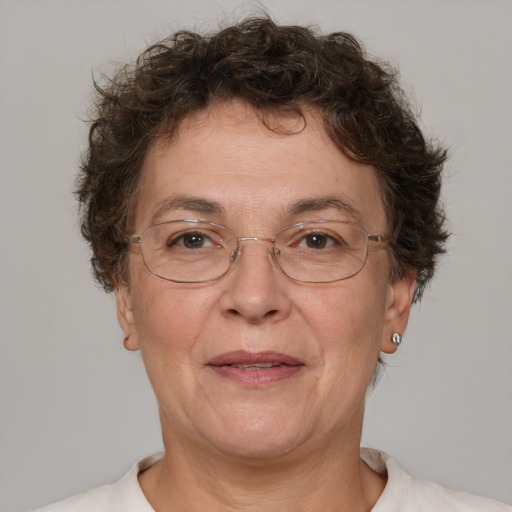 Joyful white middle-aged female with short  brown hair and brown eyes