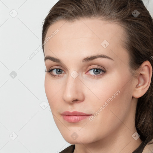 Neutral white young-adult female with long  brown hair and grey eyes