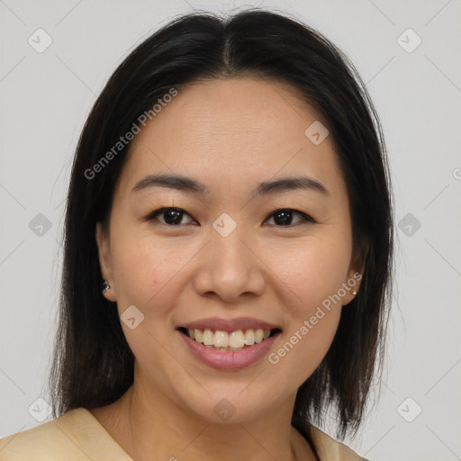 Joyful latino young-adult female with medium  brown hair and brown eyes