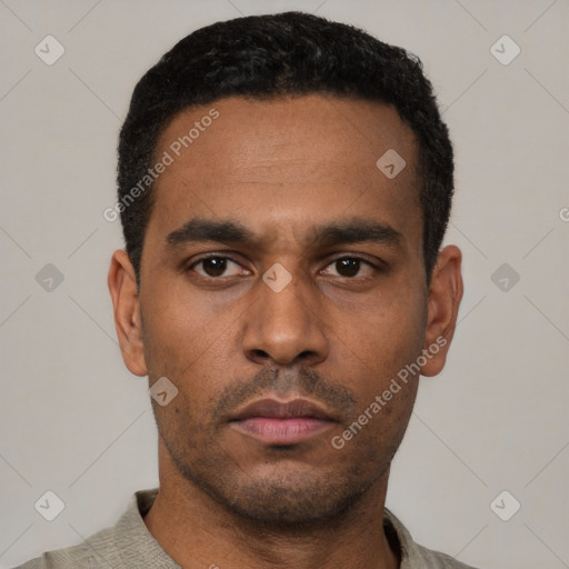 Neutral latino young-adult male with short  black hair and brown eyes