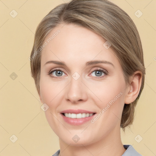 Joyful white young-adult female with medium  brown hair and green eyes