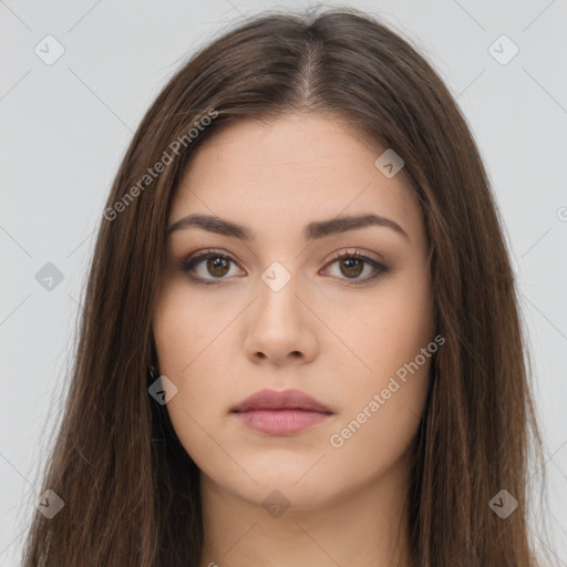 Neutral white young-adult female with long  brown hair and brown eyes