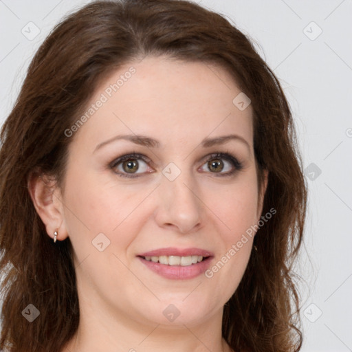 Joyful white young-adult female with long  brown hair and green eyes