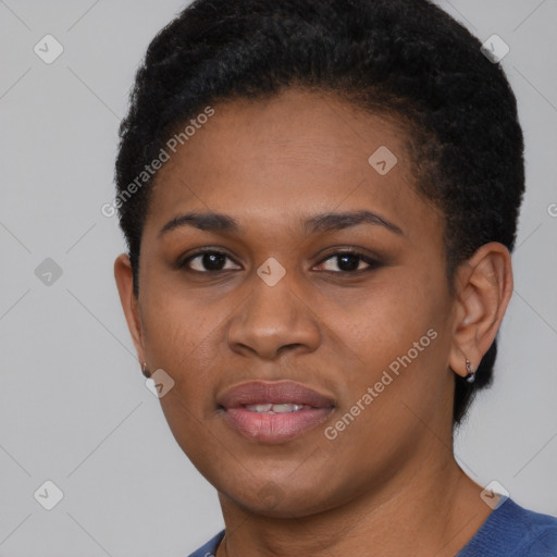 Joyful black young-adult female with short  black hair and brown eyes