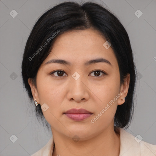 Joyful asian young-adult female with medium  black hair and brown eyes