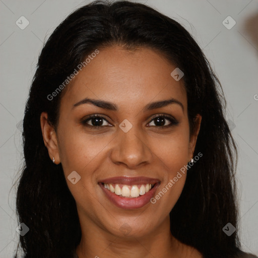 Joyful latino young-adult female with long  brown hair and brown eyes