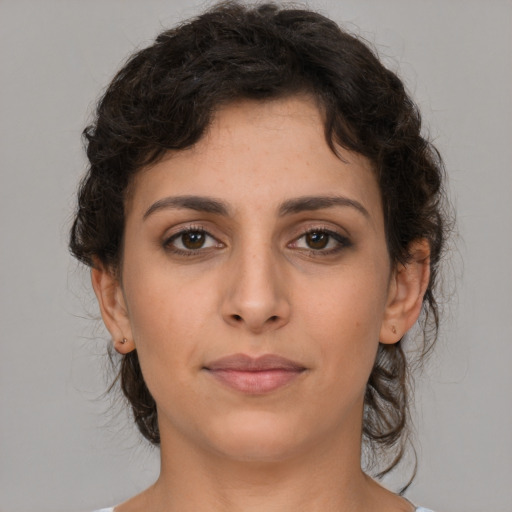 Neutral white young-adult female with short  brown hair and brown eyes