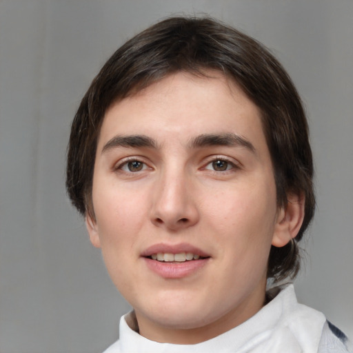 Joyful white young-adult male with medium  brown hair and brown eyes