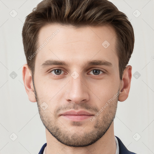 Neutral white young-adult male with short  brown hair and grey eyes