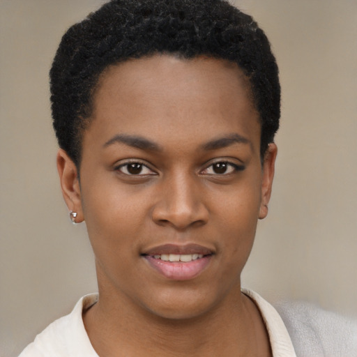 Joyful latino young-adult female with short  black hair and brown eyes