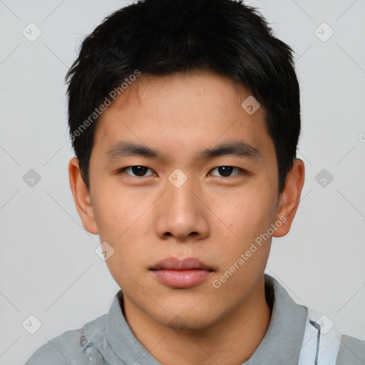 Neutral asian young-adult male with short  brown hair and brown eyes