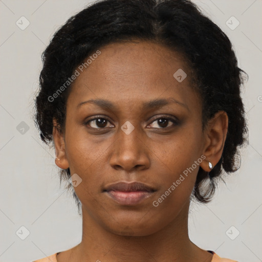 Neutral black young-adult female with medium  black hair and brown eyes