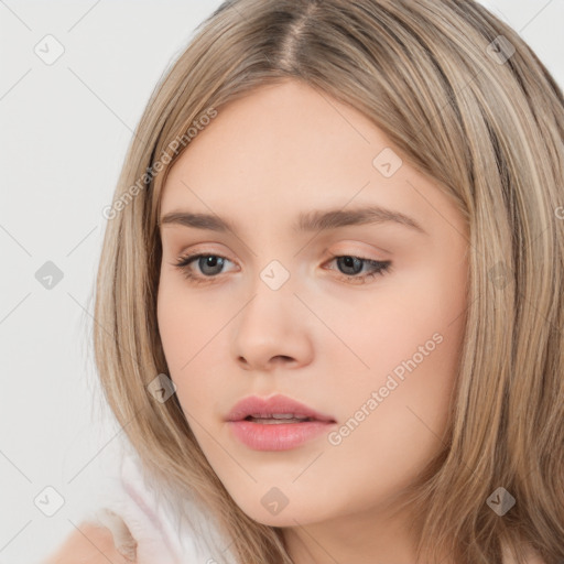 Neutral white young-adult female with long  brown hair and brown eyes