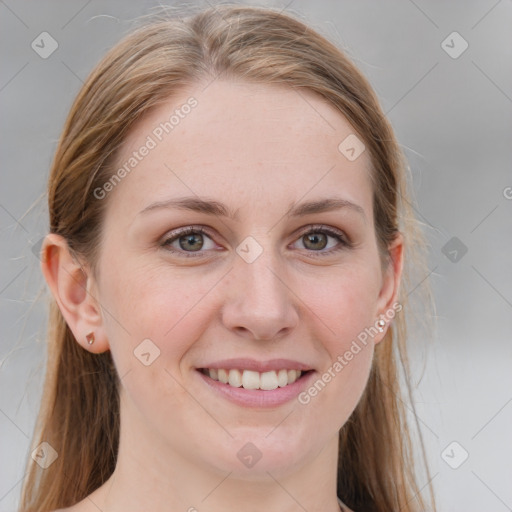 Joyful white young-adult female with medium  brown hair and blue eyes