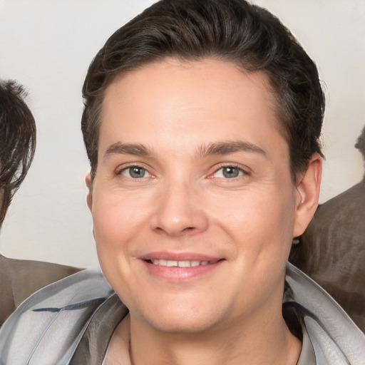 Joyful white young-adult male with medium  brown hair and brown eyes