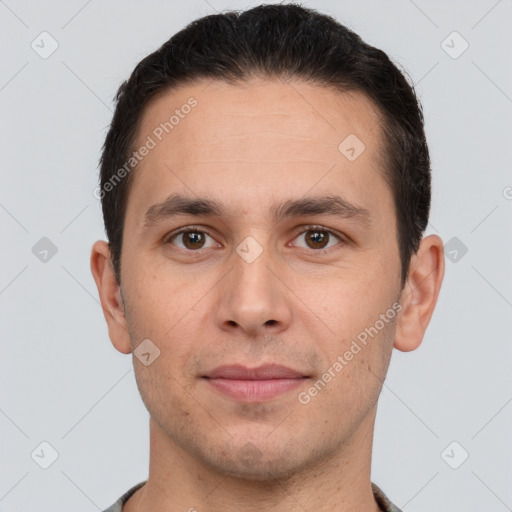 Joyful white young-adult male with short  brown hair and brown eyes