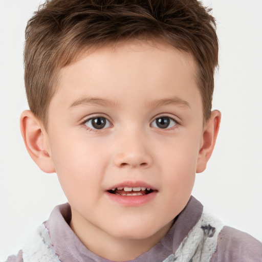 Joyful white child male with short  brown hair and brown eyes