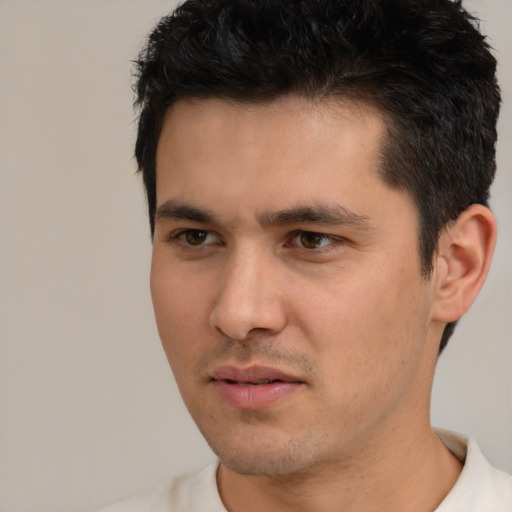 Neutral white young-adult male with short  black hair and brown eyes