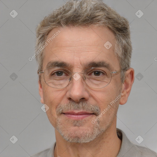 Neutral white middle-aged male with short  gray hair and brown eyes