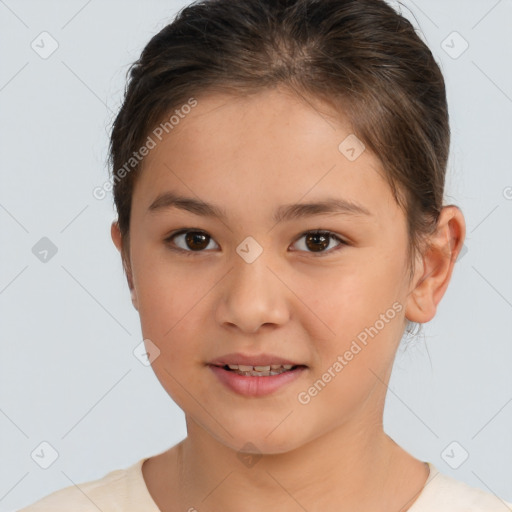 Joyful white child female with short  brown hair and brown eyes