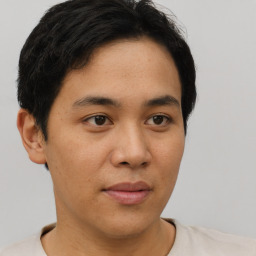 Neutral asian young-adult male with short  brown hair and brown eyes