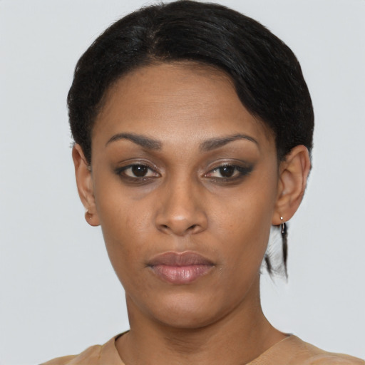 Neutral black young-adult female with short  black hair and brown eyes